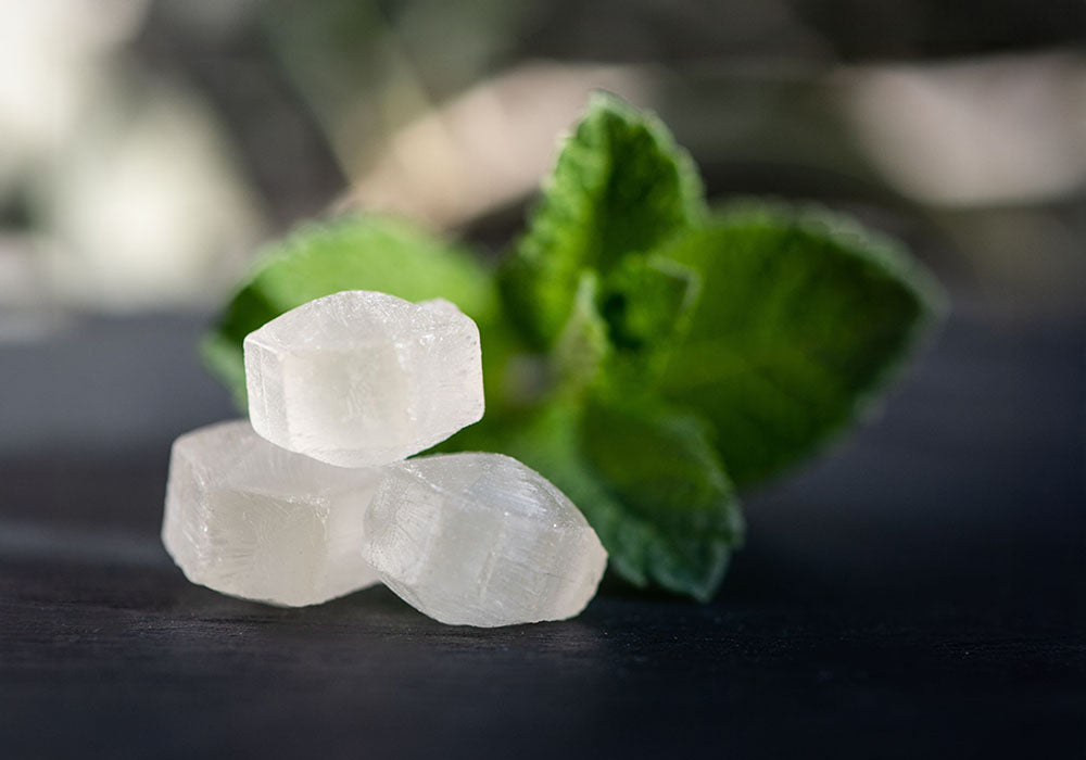 image montrant les pastilles menthe sans sucre au cbd de la marque délicure
