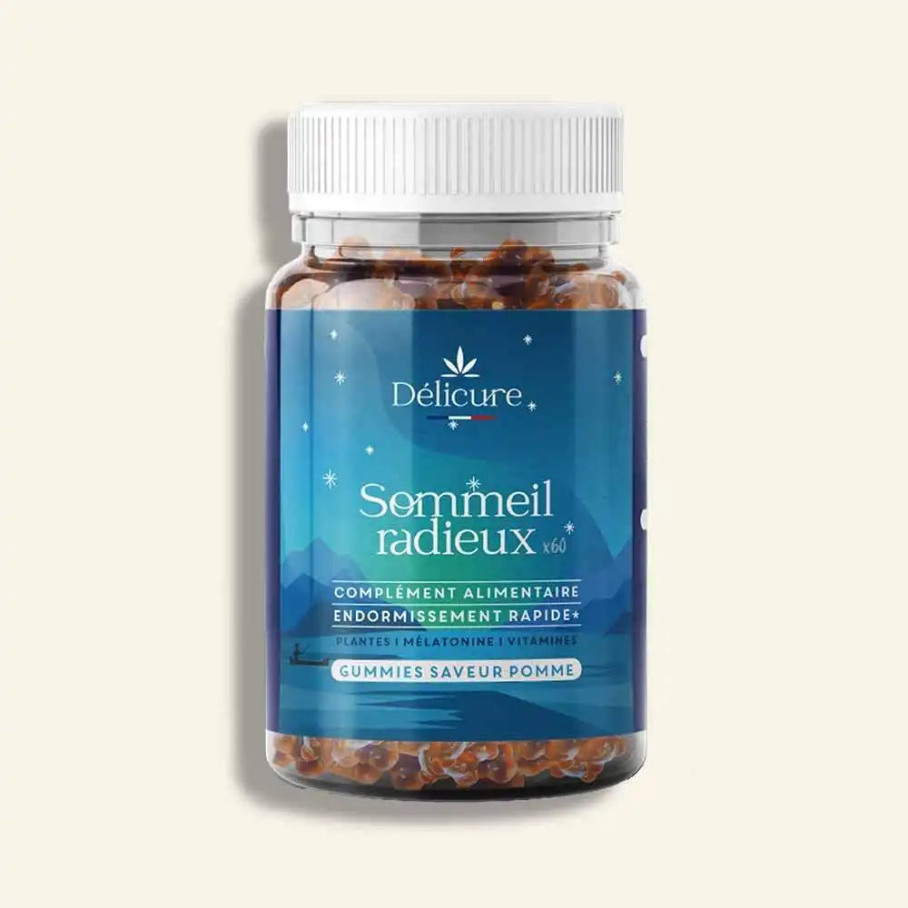 Flacon de gummies Sommeil Délicure, au design bleu étoilé, complément alimentaire vegan fabriqué en France, à base de plantes, mélatonine et vitamines.